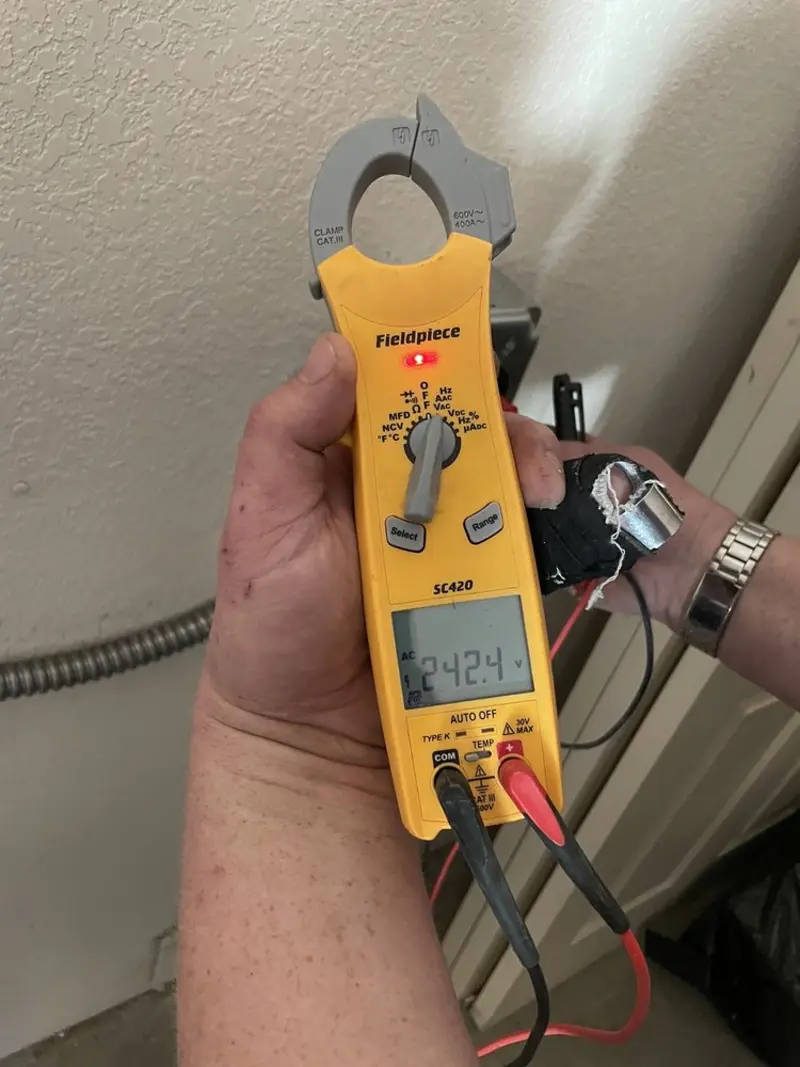 Voltage testing with clamp meter during Electrical Installation Services in Seal Beach